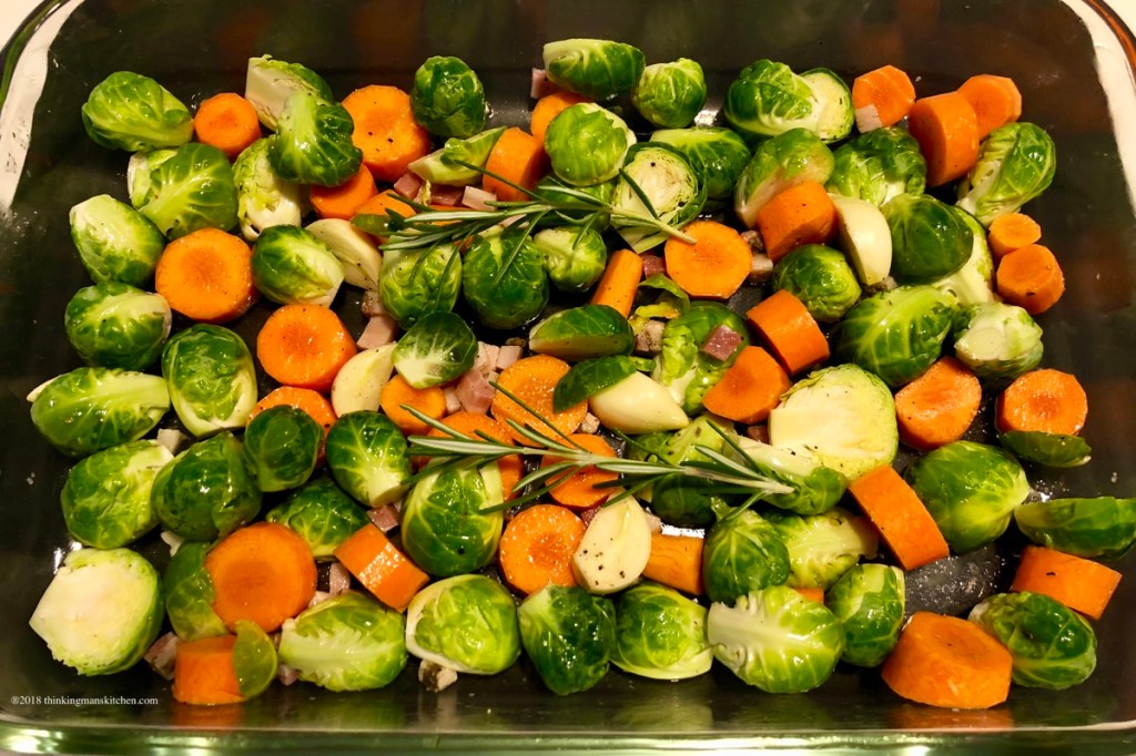 Brussels sprouts and carrots ready for the oven